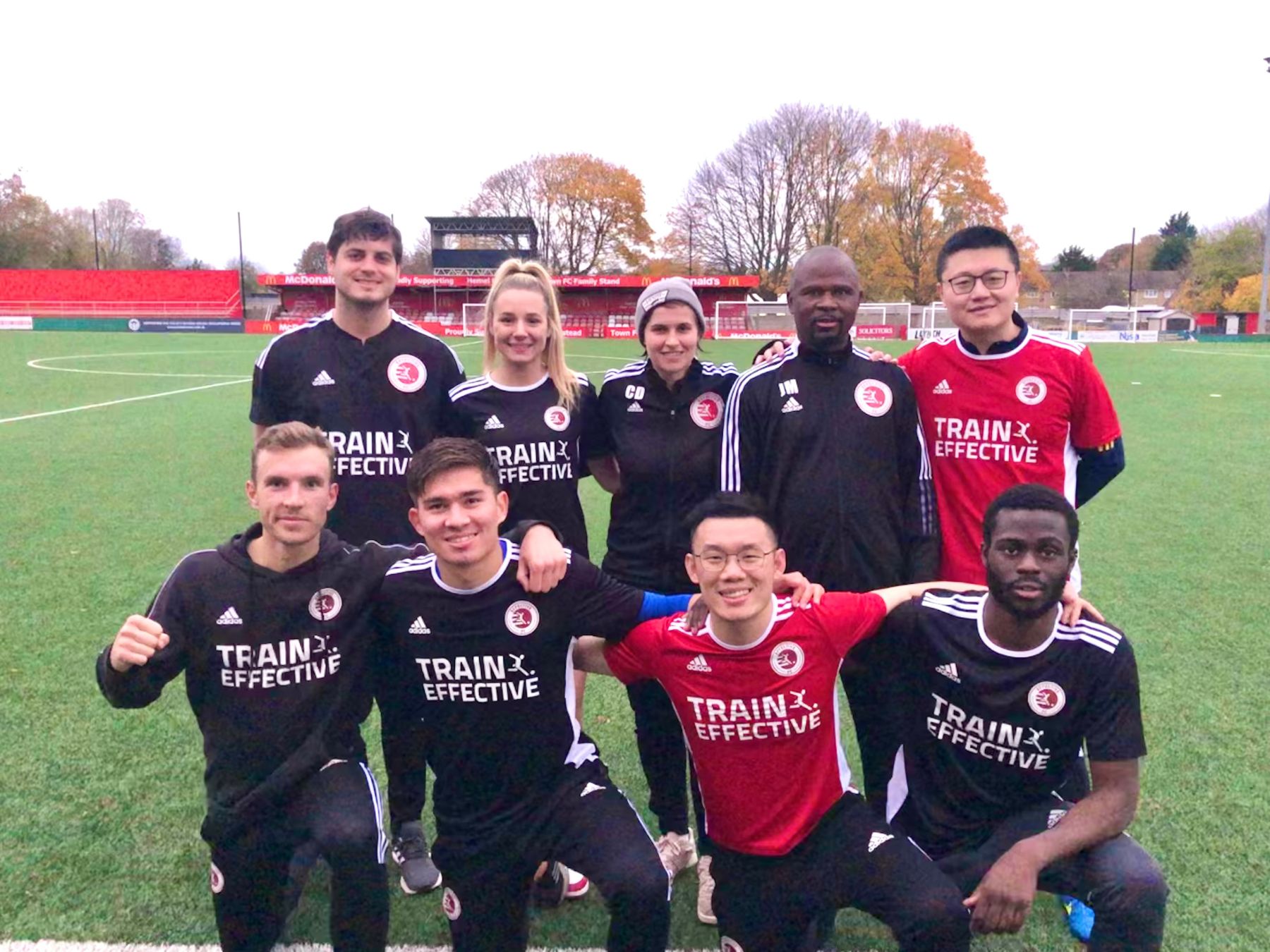 Samuel Siew with the Train Effective team at an international football development programme in London