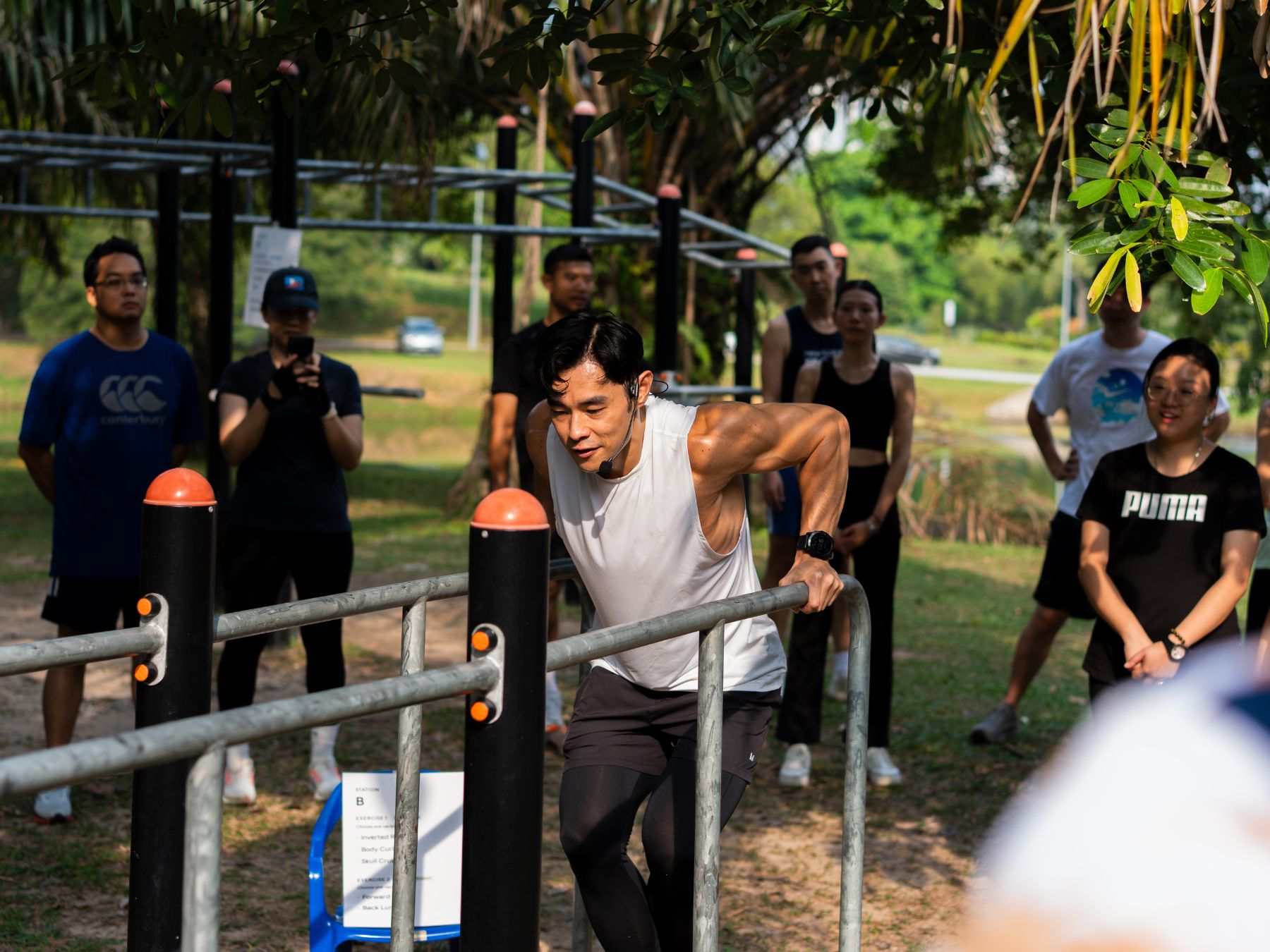 Jordan Yeoh leading a community fitness activation at the PARC Subang calisthenics park