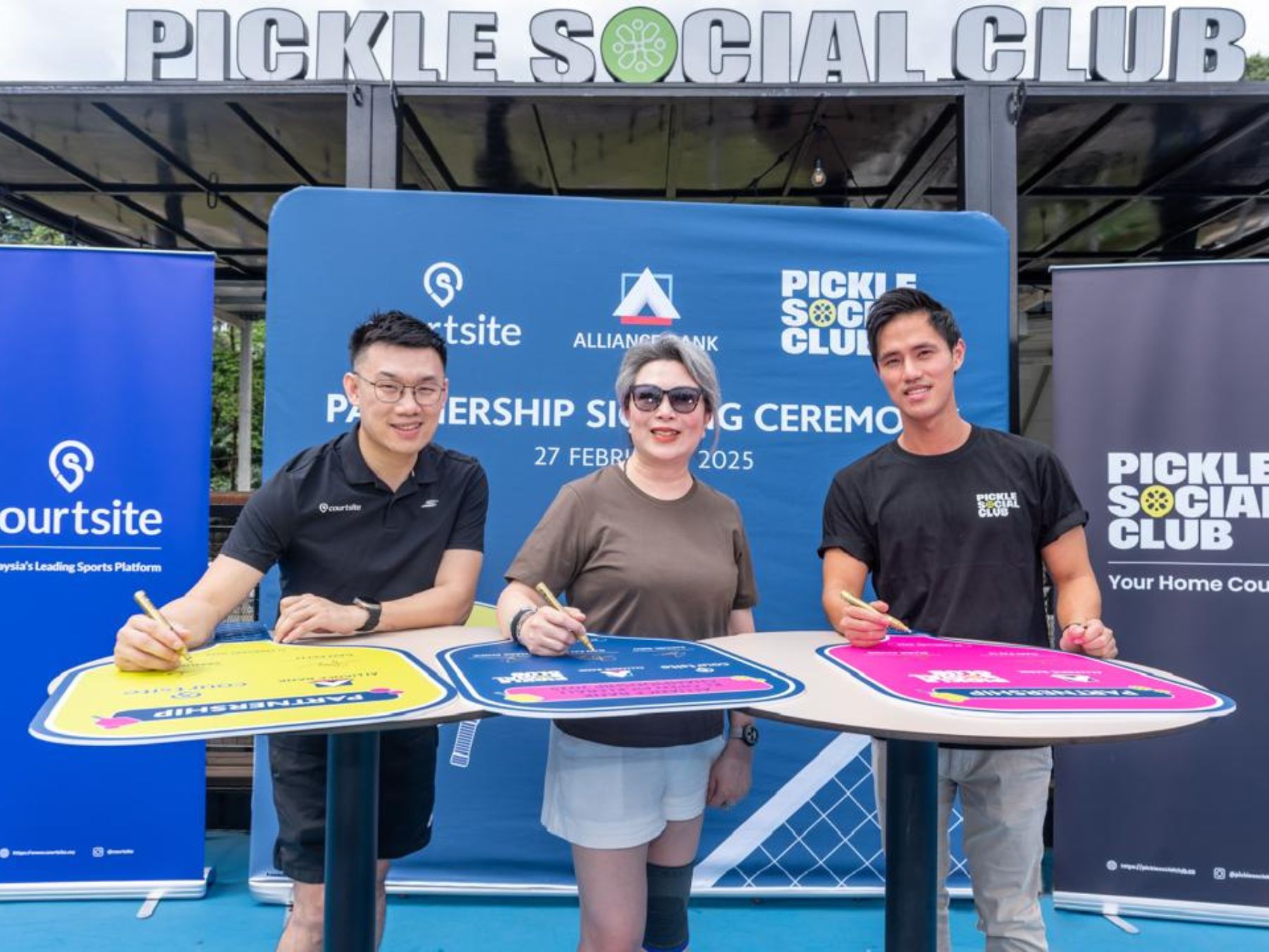 Alliance Bank, Courtsite and Pickle Social Club representatives formalising Malaysia’s first bank partnership in pickleball