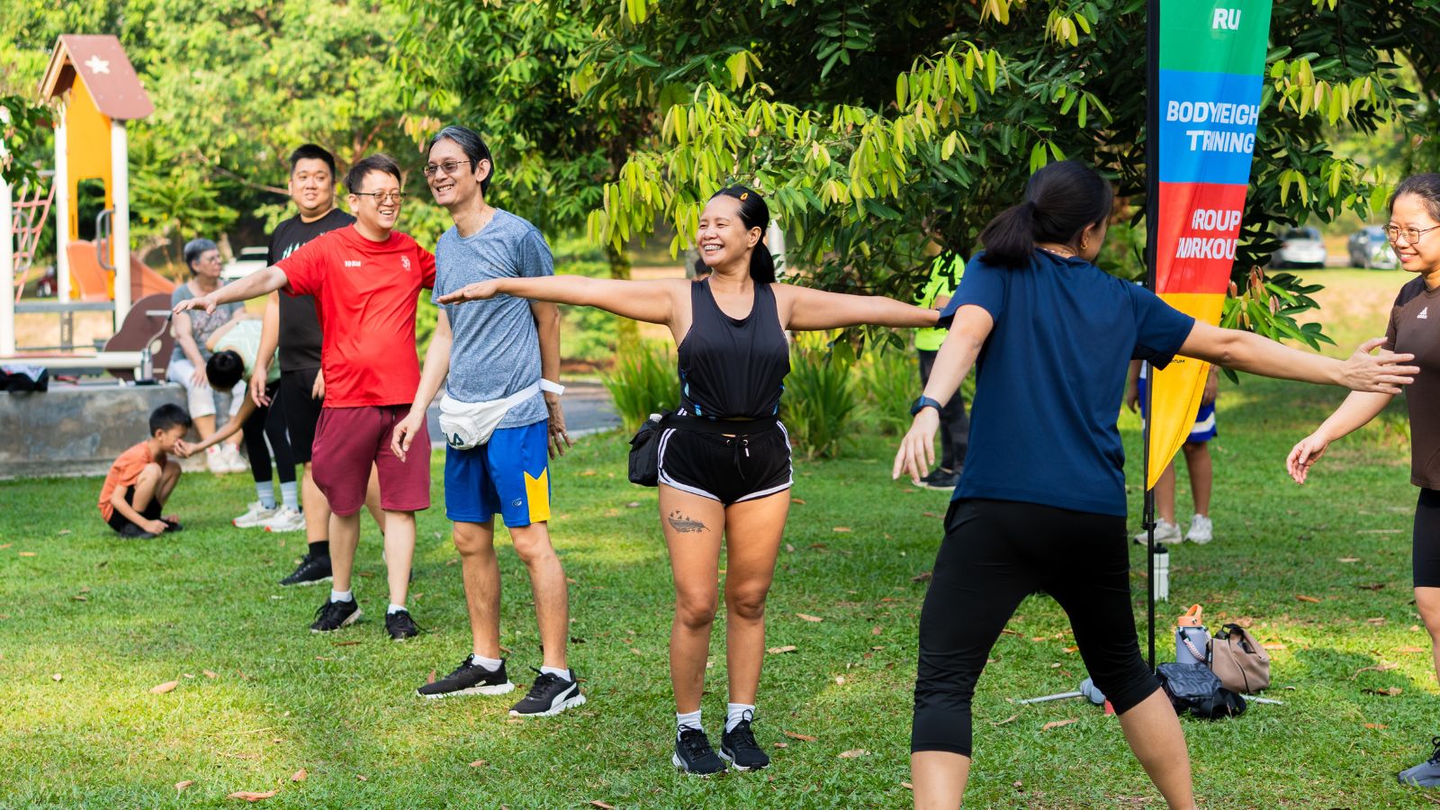 Participants warming up together during a community fitness activation at PARC Subang